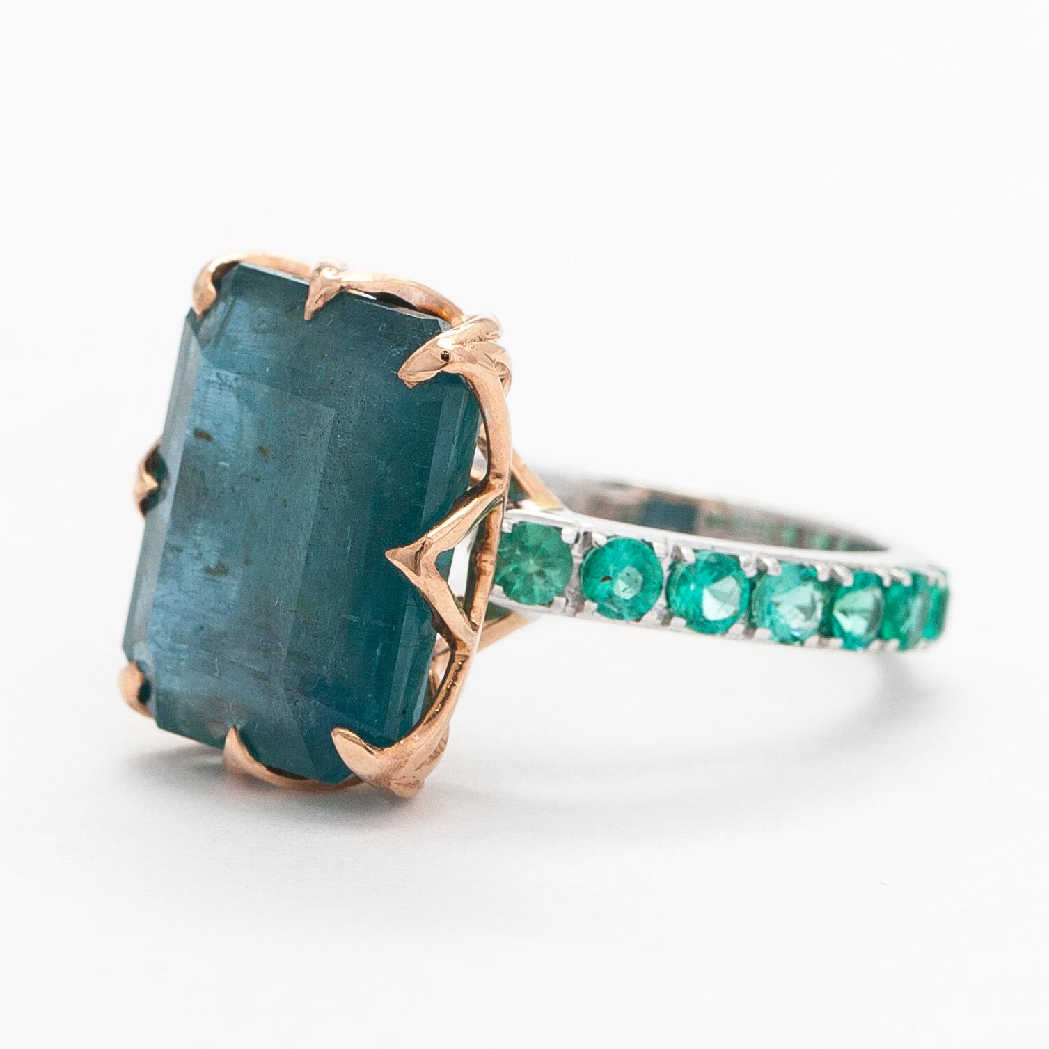 A 14K gold ring with emeralds. IGI certificate.