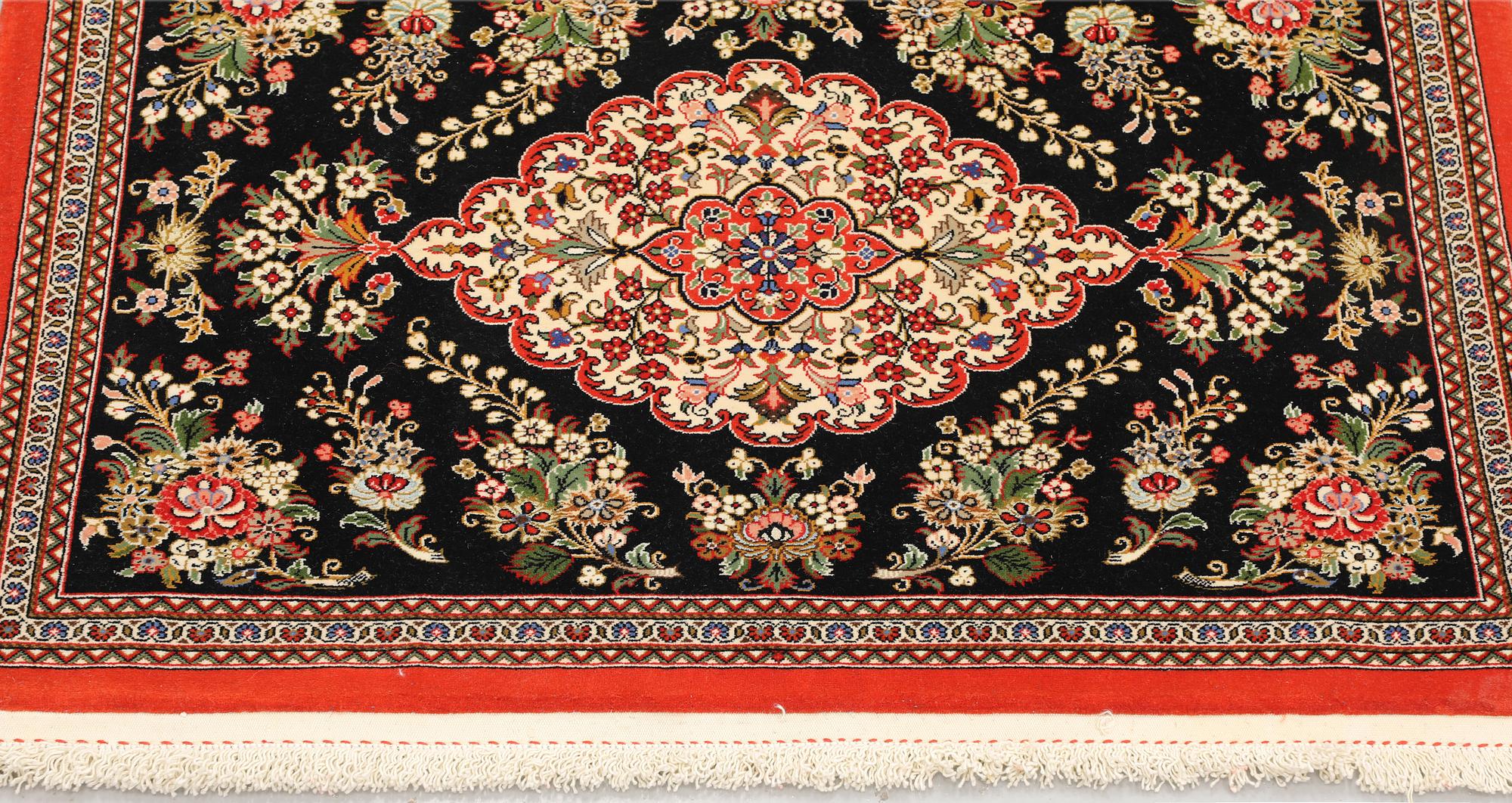 A pair of Tabriz rugs, part silk, so-called 50 Raj, 92 x 62 cm.
