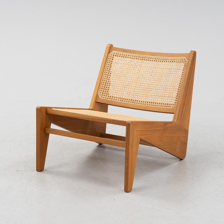 Pierre Jeanneret, a teak and rattan '058 Kangaroo' easy chair, Cassina, Italy.