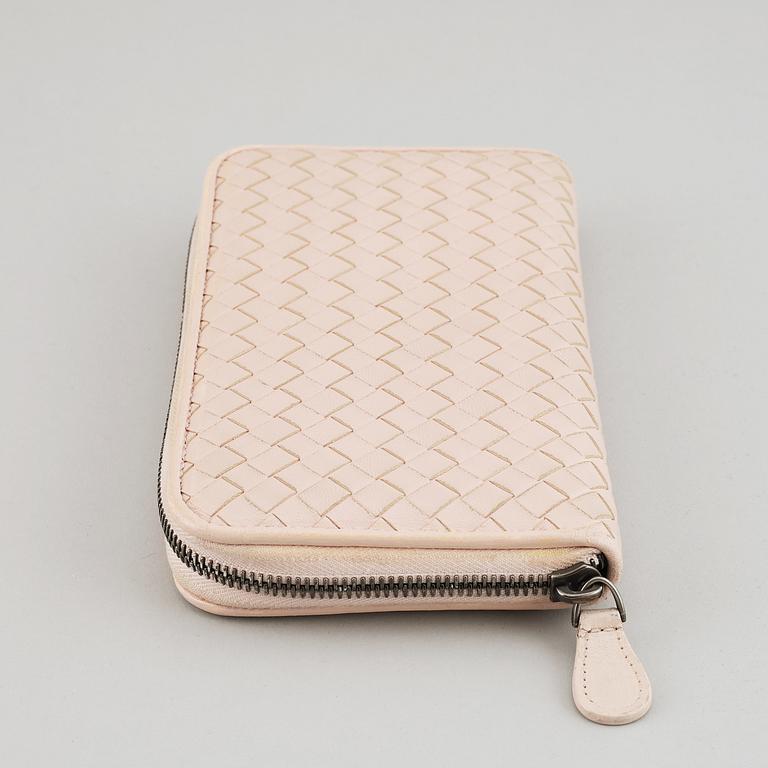 BOTTEGA VENETA, a intrecciato leather wallet.