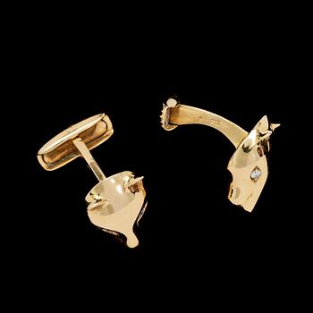 CUFFLINKS, shape of panthers head, gold with brilliant cut diamonds, tot. app. 0.12 ct. Weight 13 g.