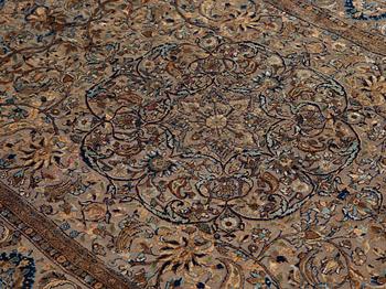 A RUG. A semi-antique silk Kashan Souf (in relief). 210 x 131,5 cm (as well as one cm flat weave at each end).