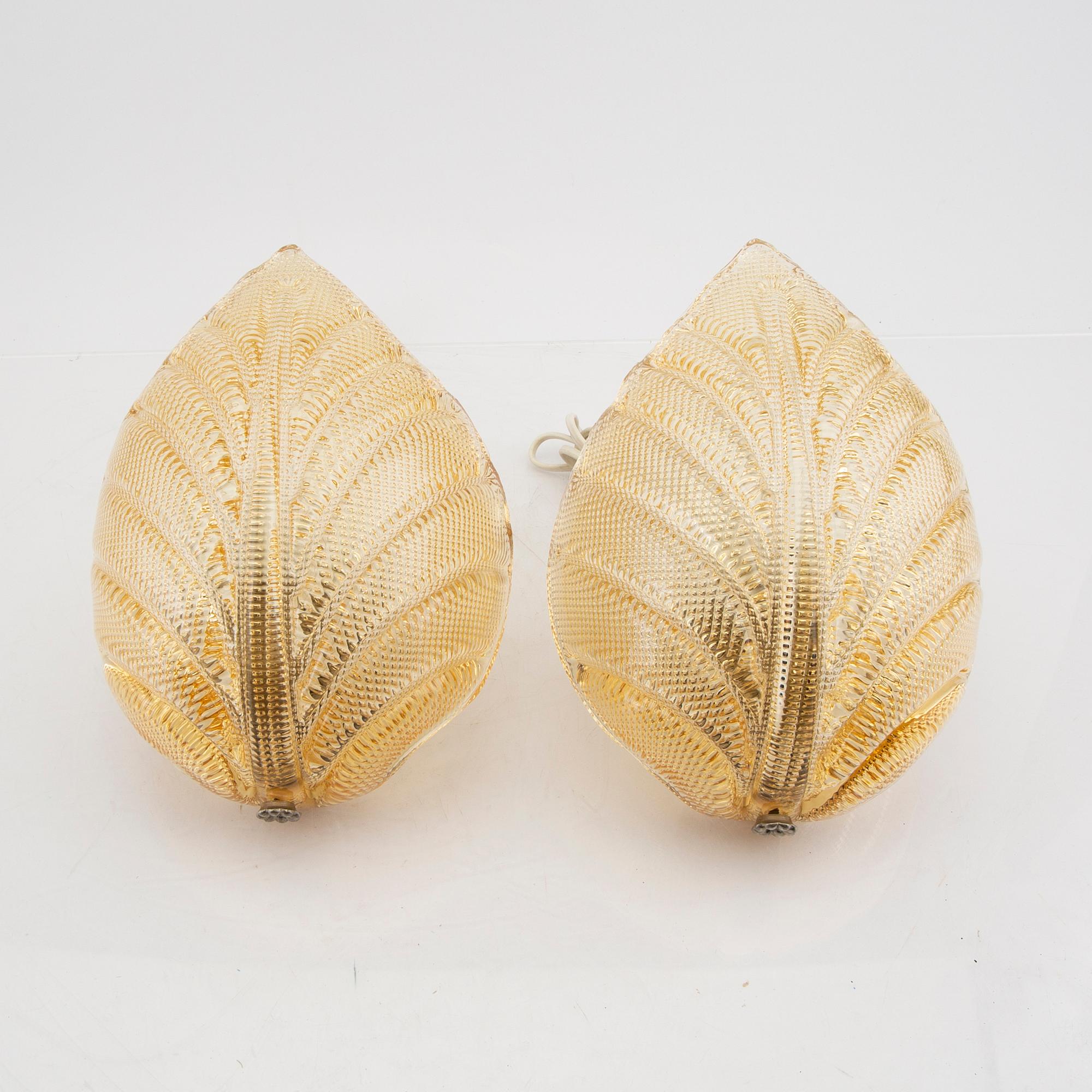A pair of Possibly Orrefors glass wall scones mid 1900s.