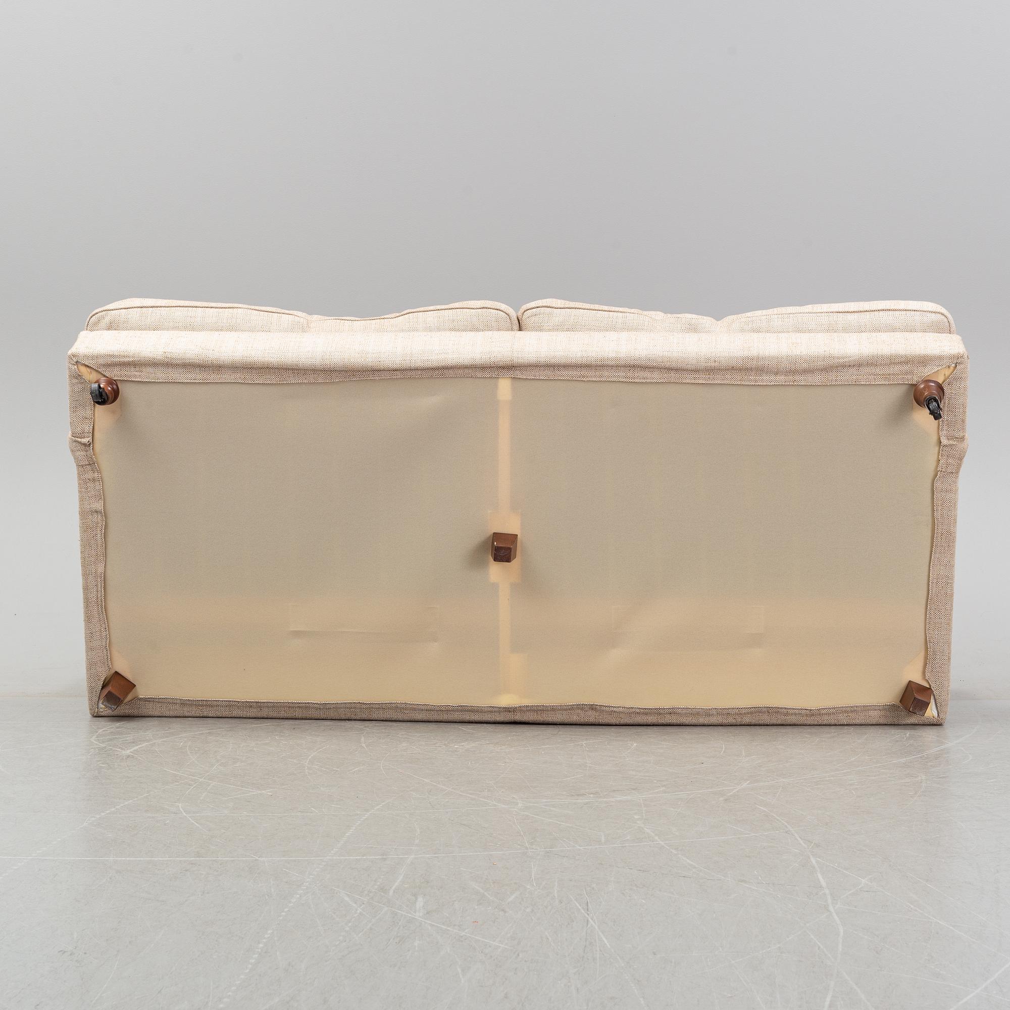 A 'Raffles' sofa designed by Vico Magistretti in 1988 for DePadova.