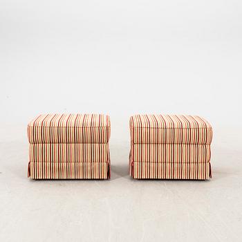 A pair of easy chairs with footstools by Bröderna Andersson 21st century.