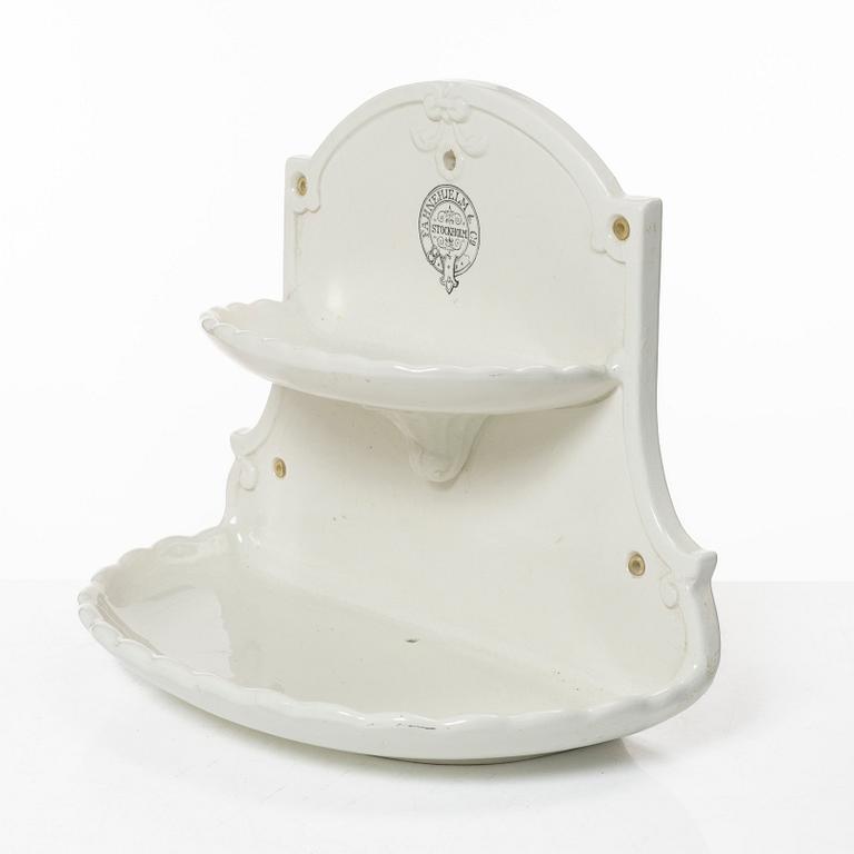 A bathroom shelf, porcelain, Fahnehjelm & Co., early 20th century.