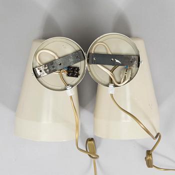 A pair of 1960s wall lights model AH 74, for Itsu.