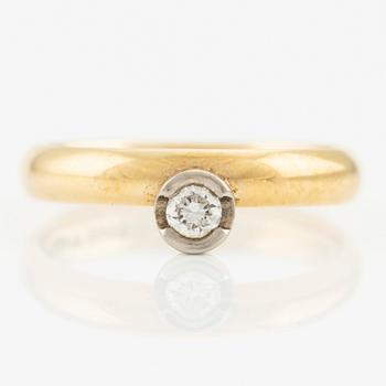 Ring in 18K gold with a round brilliant-cut diamond.