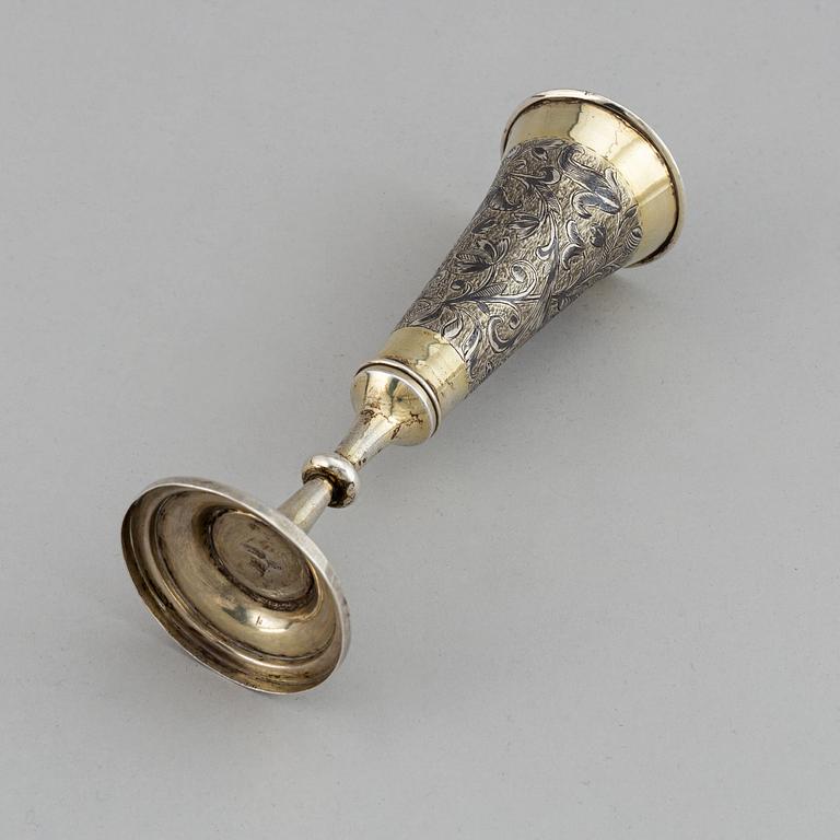 A Russian silver gilt and niello champagne flute, unidentified makers mark, Moscow 1843.
