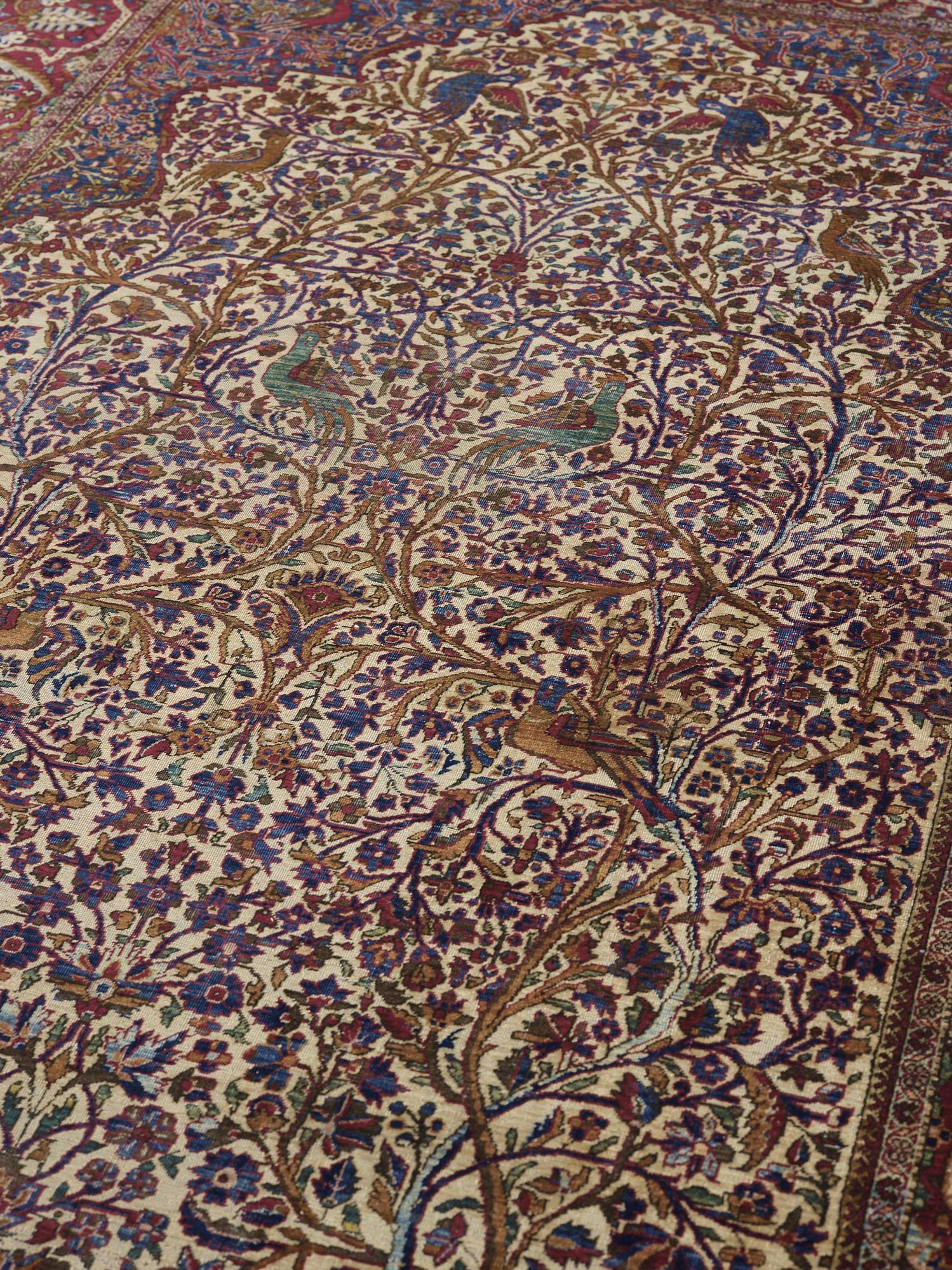 A CARPET, a semi-antique silk Kashan, ca 198,5 x 137 cm.