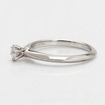 Tiffany & Co, a platinum ring with a diamond 0.19 ct. according to engraving.