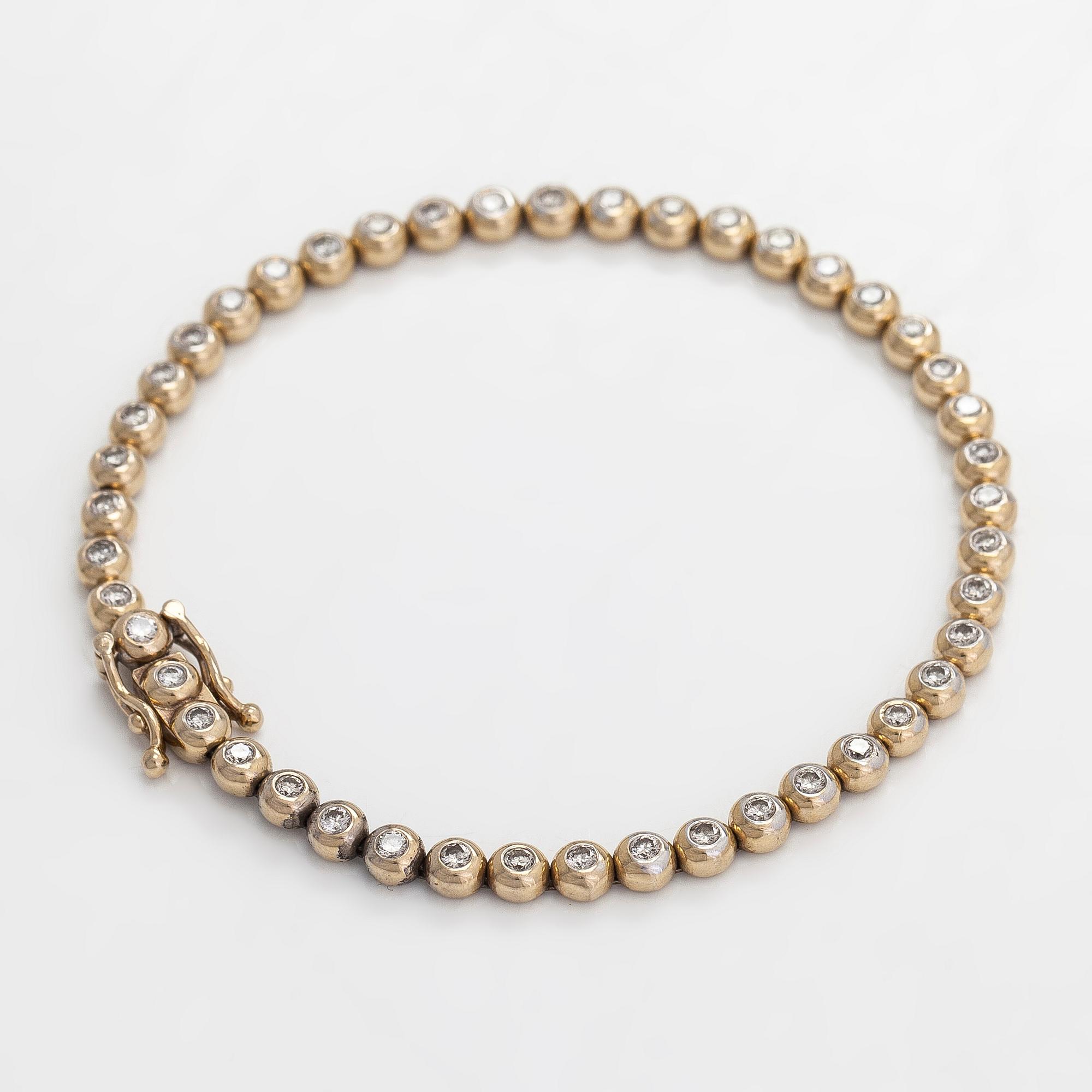 Tennisrannekoru, 18K kultaa ja timantteja yhteensä noin 0.78 ct.