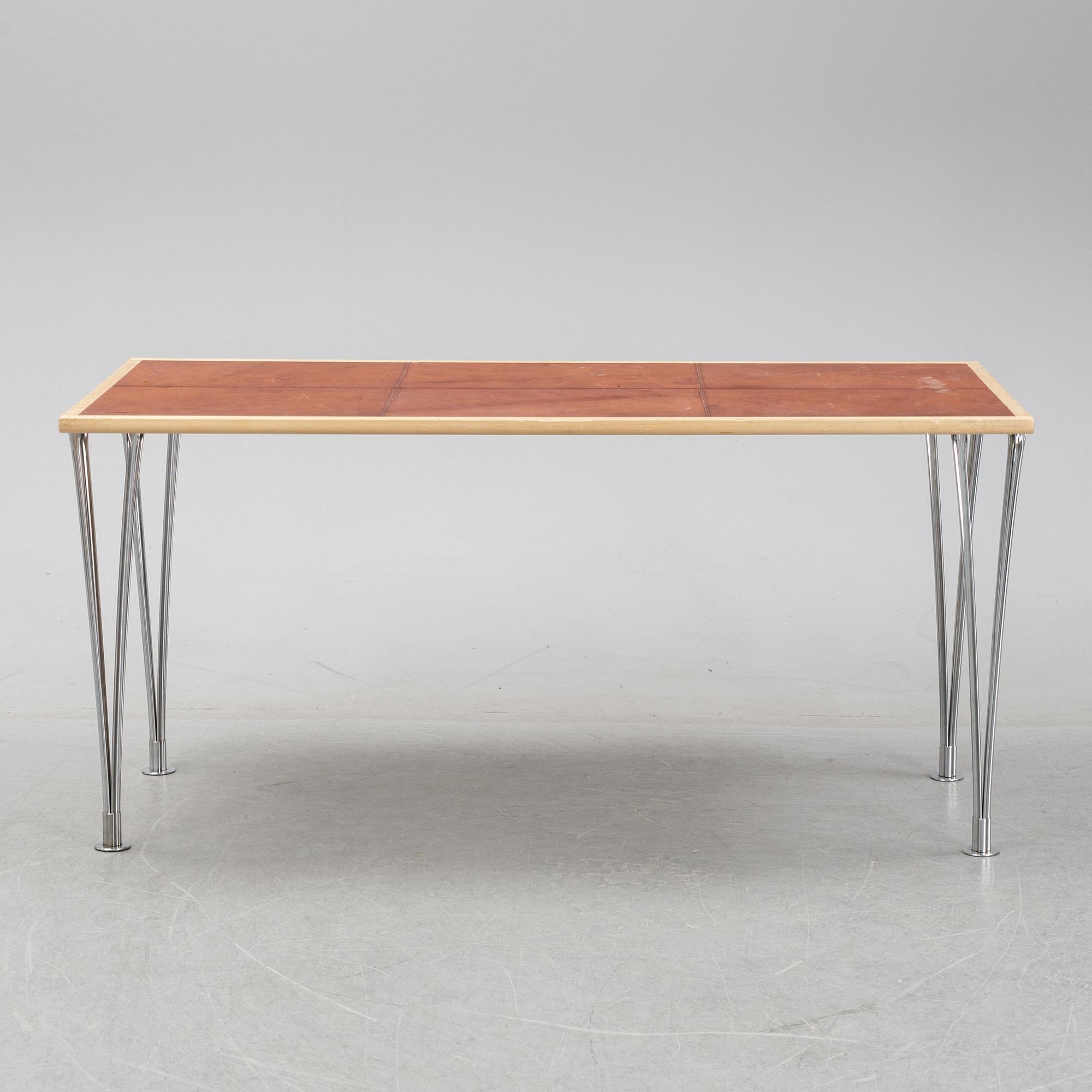 A birch and leather dining table produced by Mathsson International, 21th century.