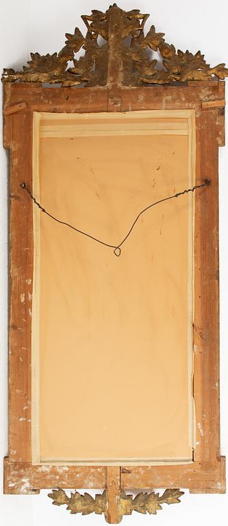 A Gustavian style mirror, around 1900.