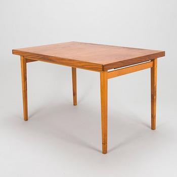 A mid-20th century dining table.