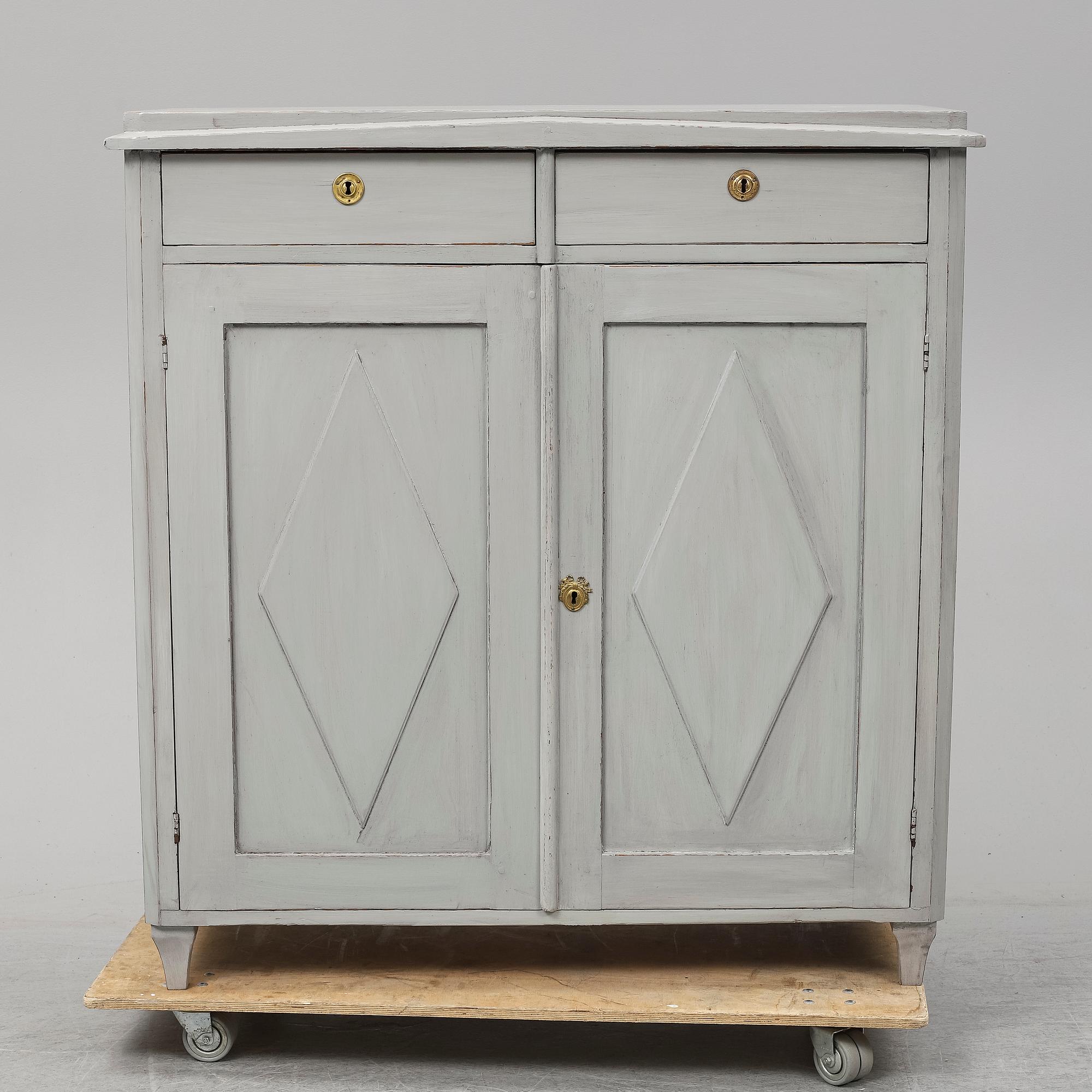 A mid 19th Century painted cupboard.