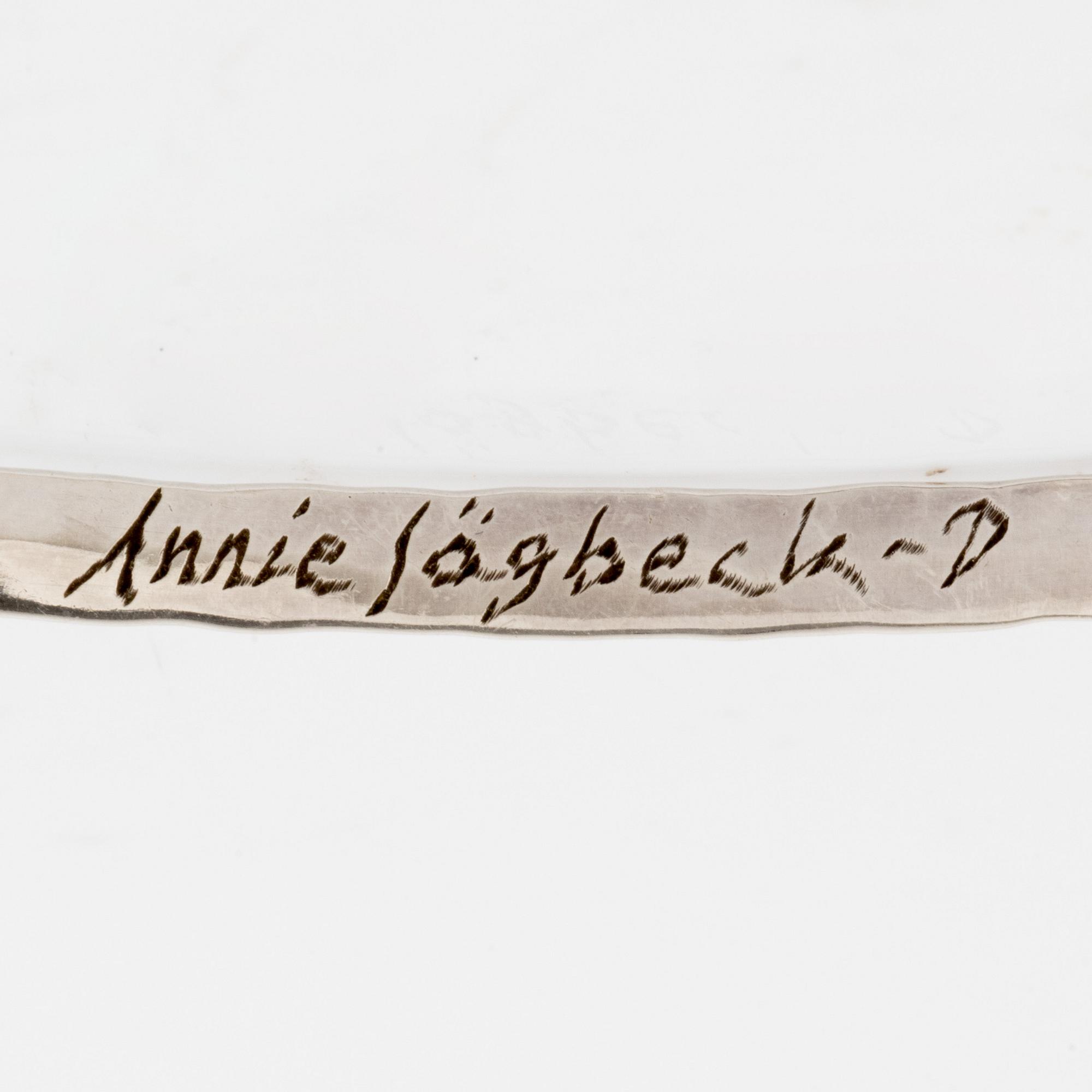 Annie Jägbeck silver necklace and earrings.