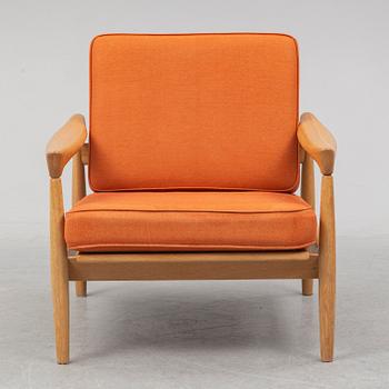 ERIK WÖRTZ, a 'Kolding' oak easy chair from IKEA, 1960's.