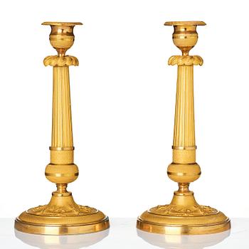 A pair of Empire ormolu three light Candelabra.