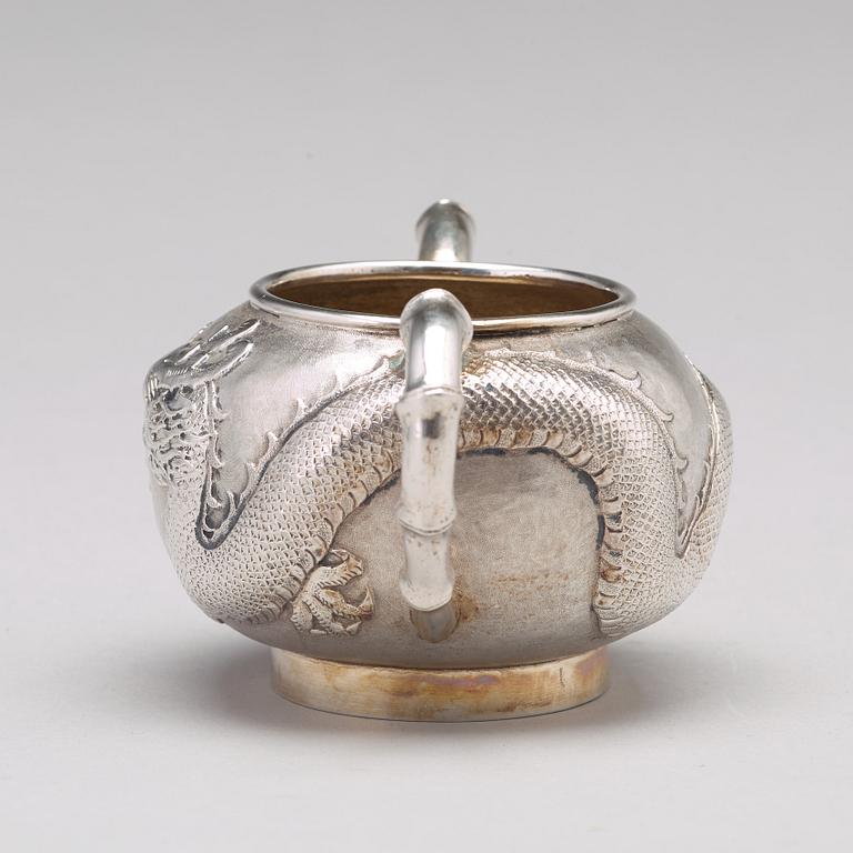 A Chinese four piece silver tea set, Luen Wo, Shanghai, 1875-1925.