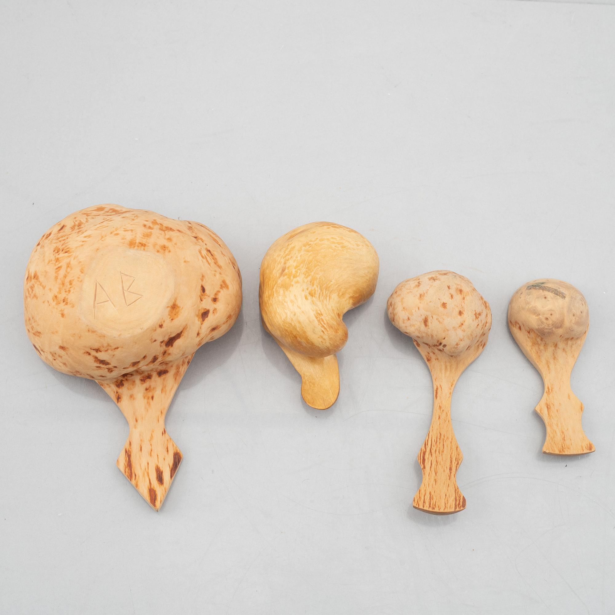 Ten carved burl wood bowls and cups, Sweden, 20th century.