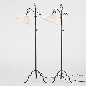 Harald Notini, a pair of wrought iron floor lamps, model "15101", Arvid Böhlmarks Lampfabrik, 1930s.