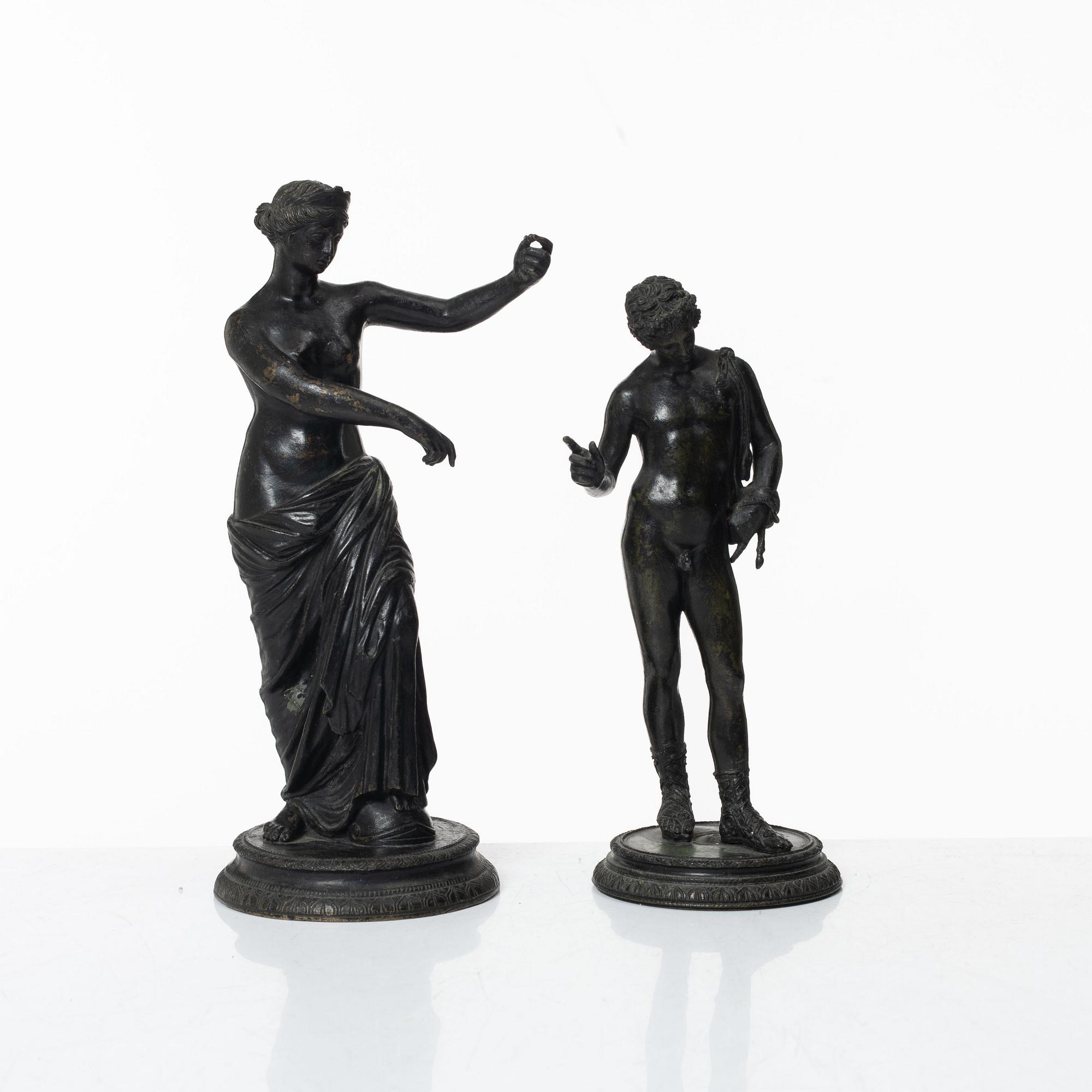 Two bronze sculptures.