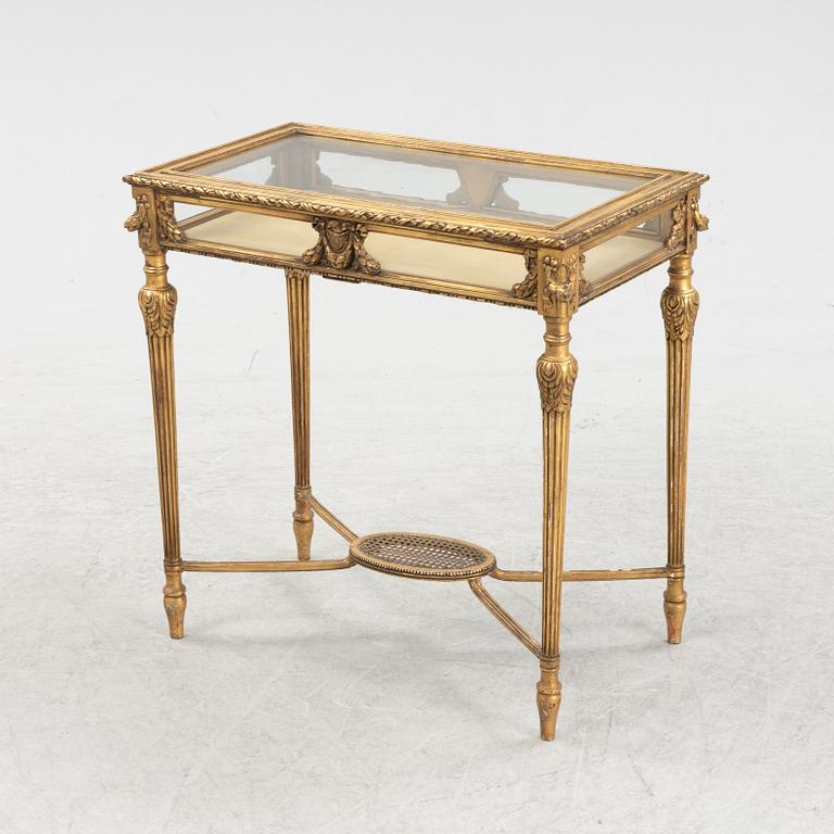 A bronzed display table, early 20th Centiury.