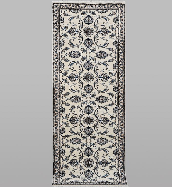 A runner carpet, Nain, part silk, ca 248 x 72 cm.