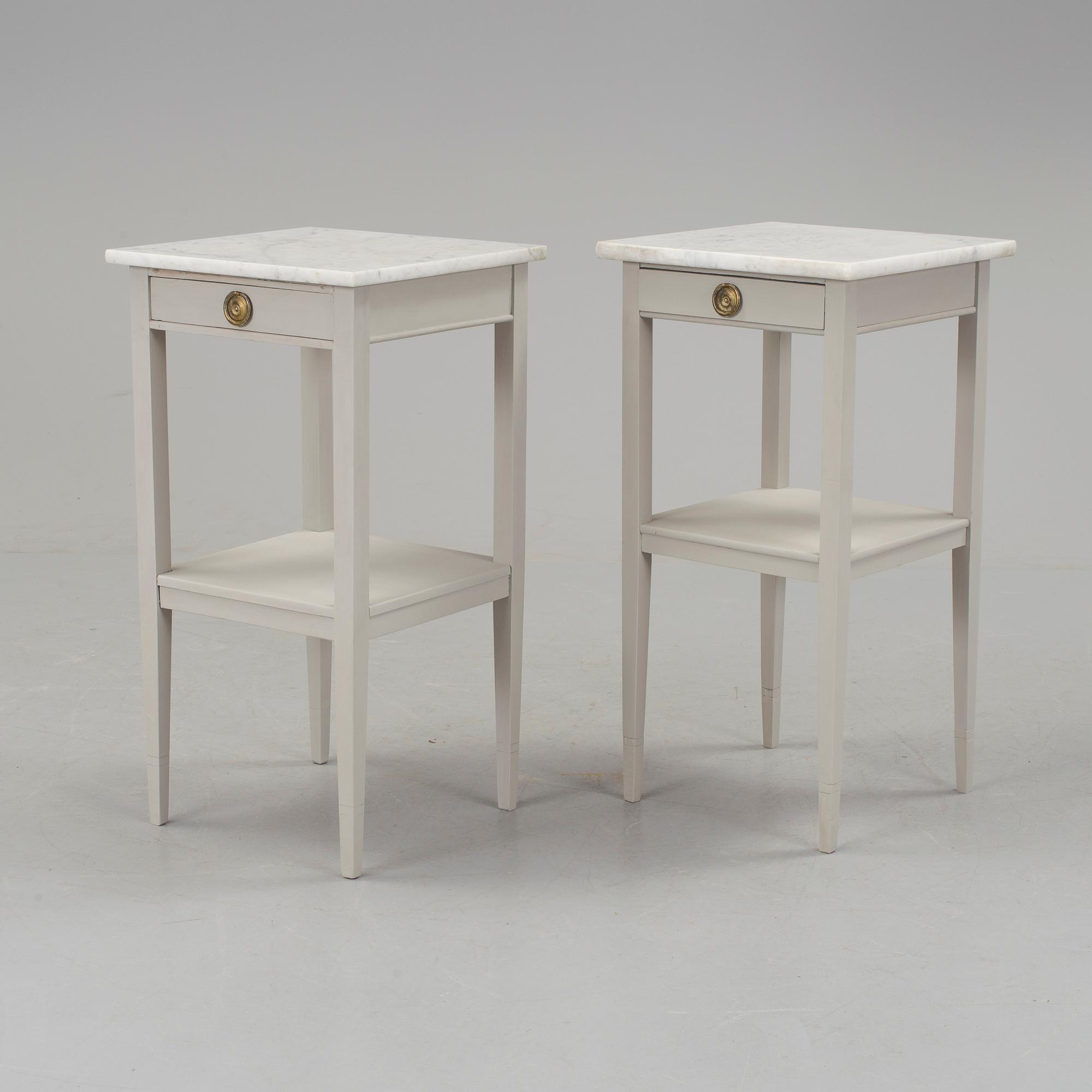 A pair of bedside tables, early 20th century.