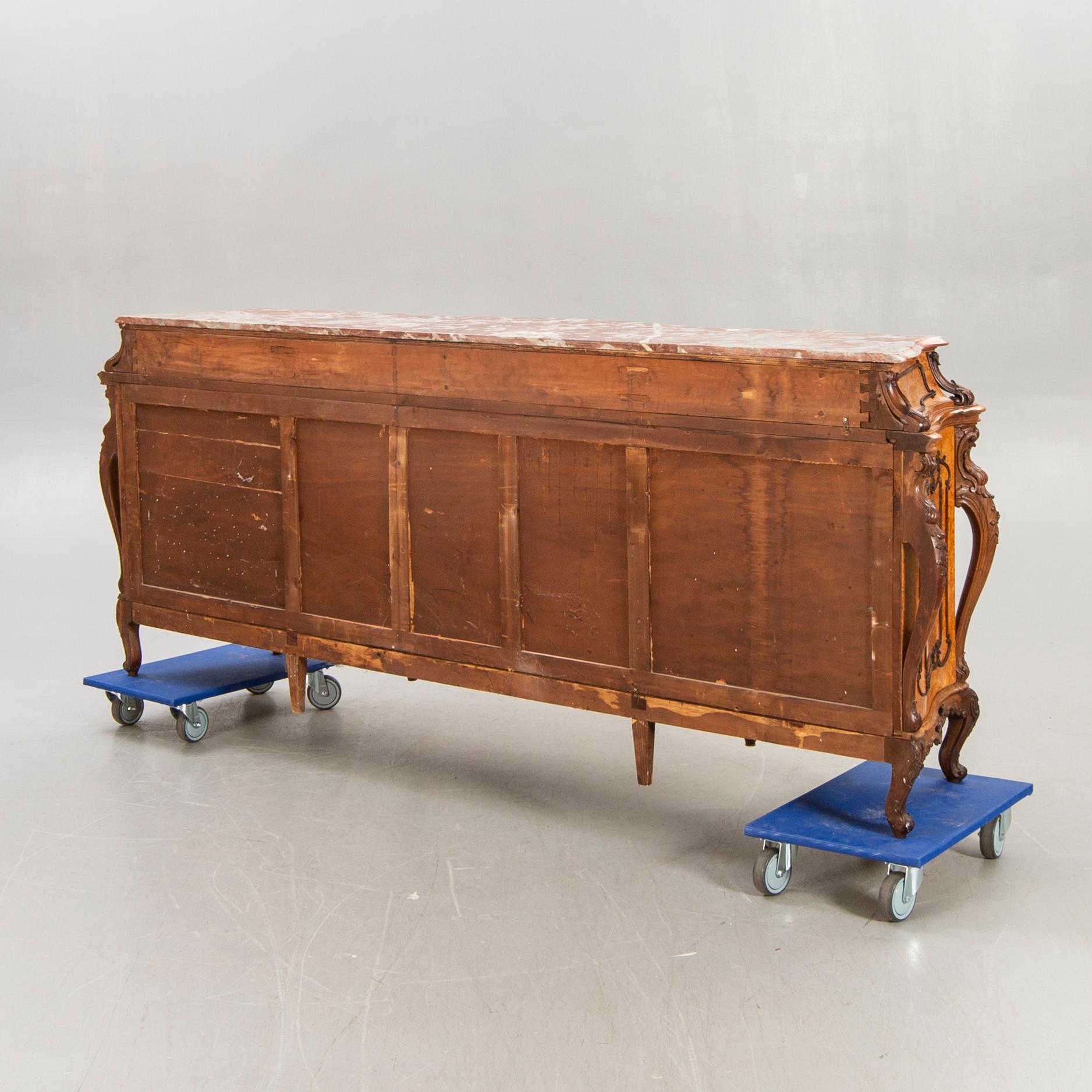A Louis XV style birch sideboard first half of the 20th century.