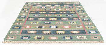 Märta Måås-Fjetterström, a carpet, "Grön äng", flat weave, ca 306 x 201 cm, signed AB MMF.