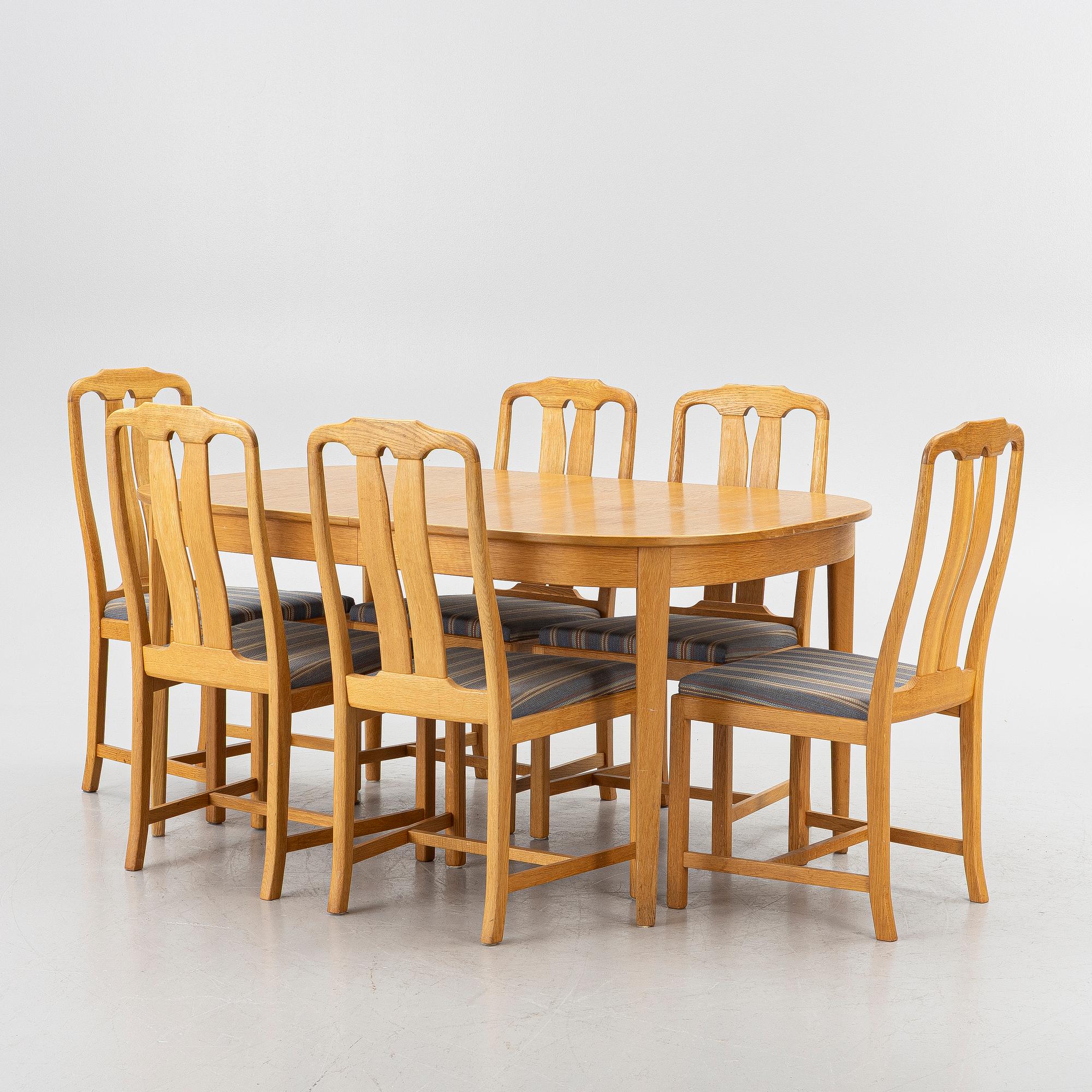 Carl Malmsten, Dining table with 6 chairs, “Ambassadör”, second half of the 20th century.