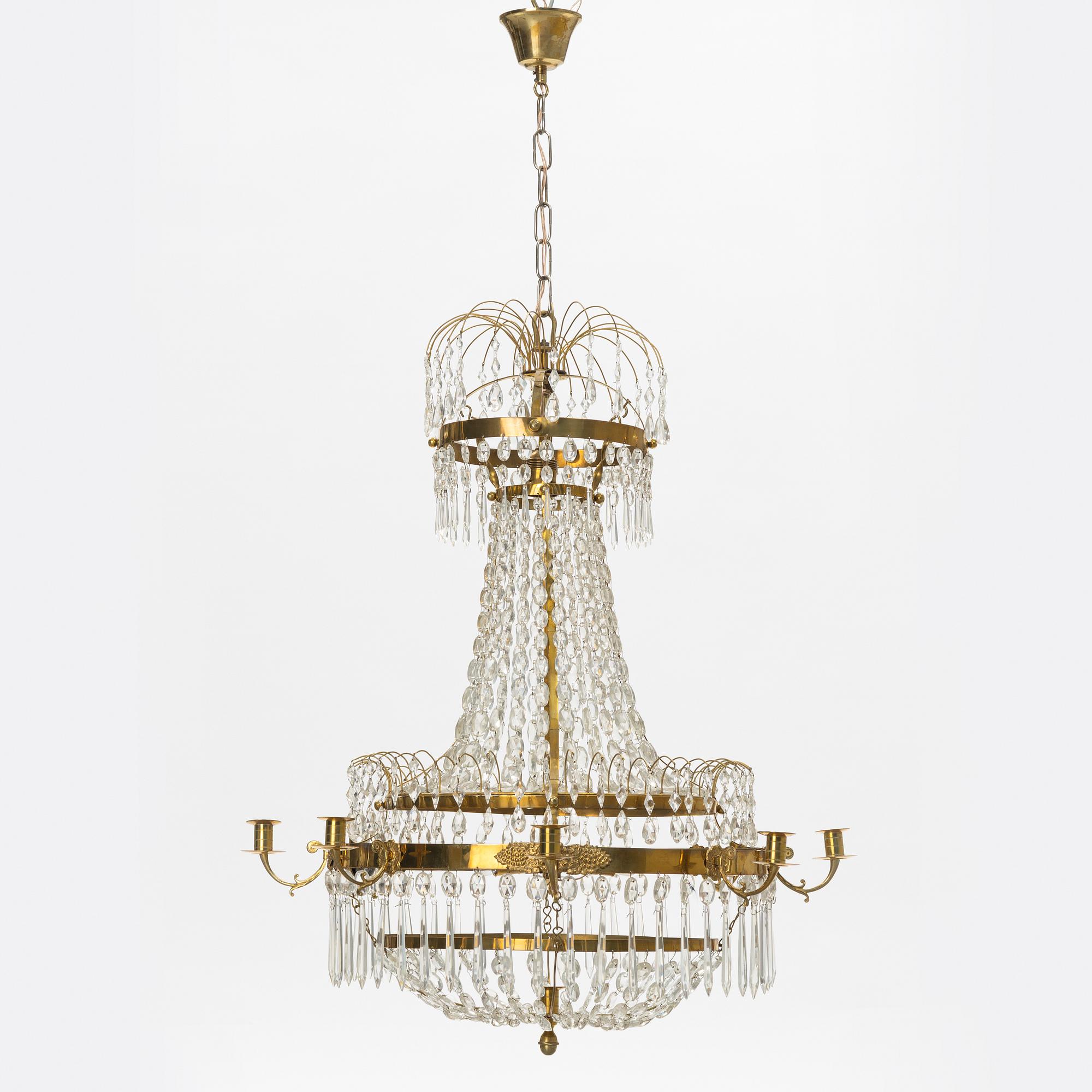 A Gustavian style 9 candle chandelier.
