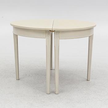 A Gustaivan style dining table/ two crescent shaped tables, end of the 19th century.