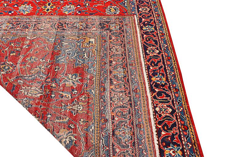 A Hamadan carpet, a. 320 x 220 cm.