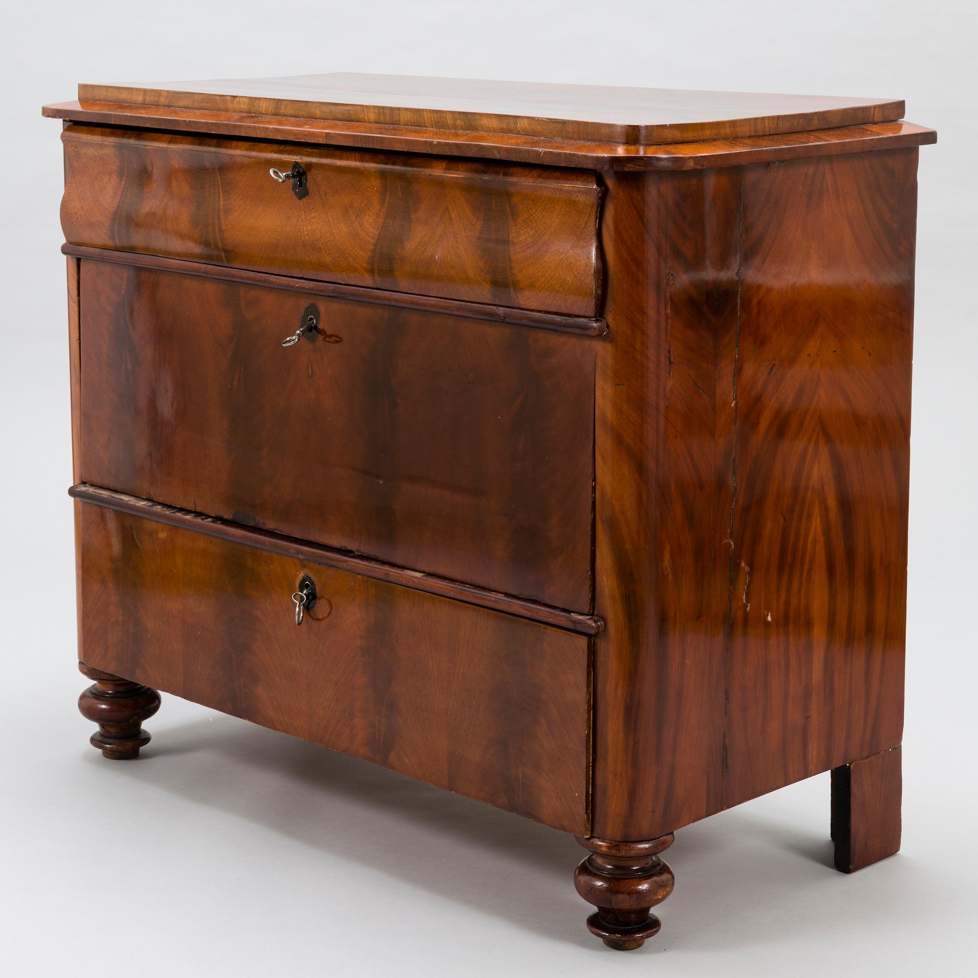 A Russian latter half of the 19th century chest of drawers in mahogany.