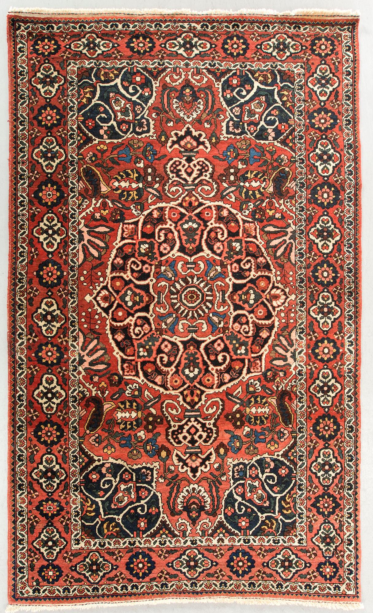 An antique Bachtiari carpet ca 205 x 134 cm.