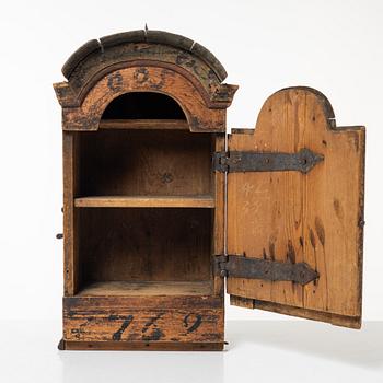A wall cabinet, West Swedish folk art, 18th century.