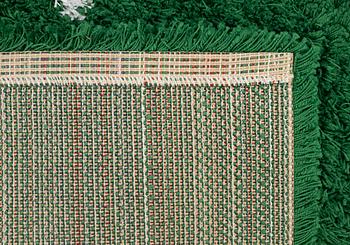 a "Wet Grass" carpet, Ikea, ca 199 x 136 cm.