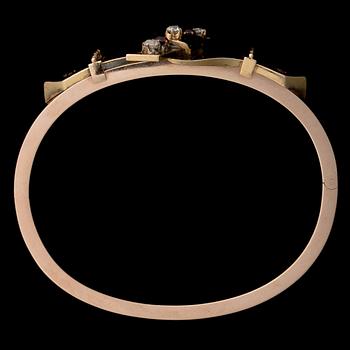 A BRACELET, old cut diamonds, garnets, 14K (56) gold. Yemelyan Kuznetsov, Moscow 1886-1897.