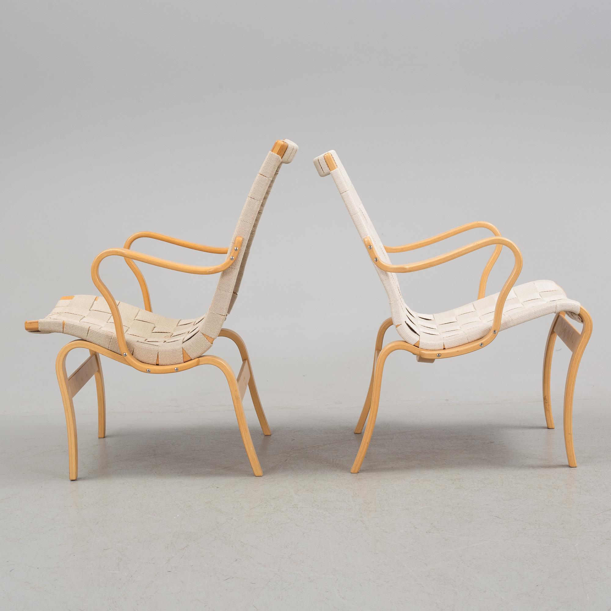 two armchairs by Bruno Mathsson, one "Eva" and one "Mina".