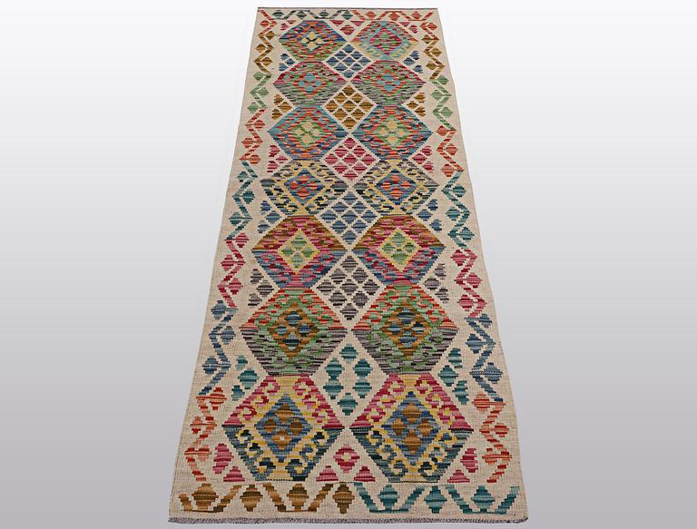 A runner, kilim, ca 249 x 67 cm.