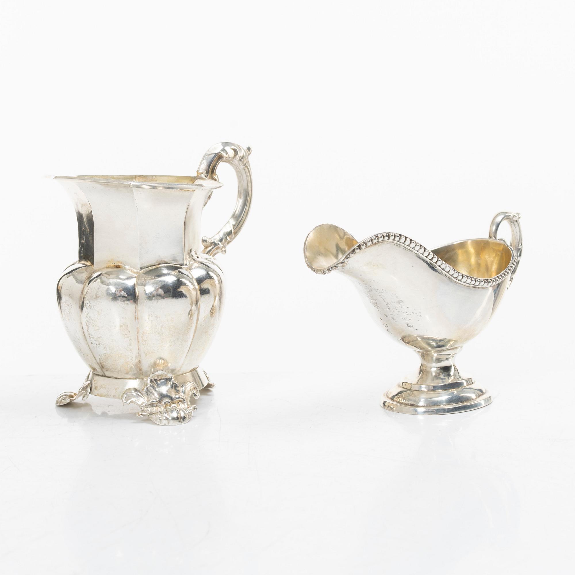A silver gravy boat, Germany, and a silver creamer, johan Petter Tullgren, Sweden, 1857.