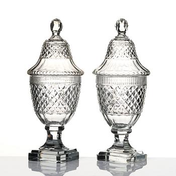 A set of two cut glass jars with covers, Anglo/Irish, 19th Century.