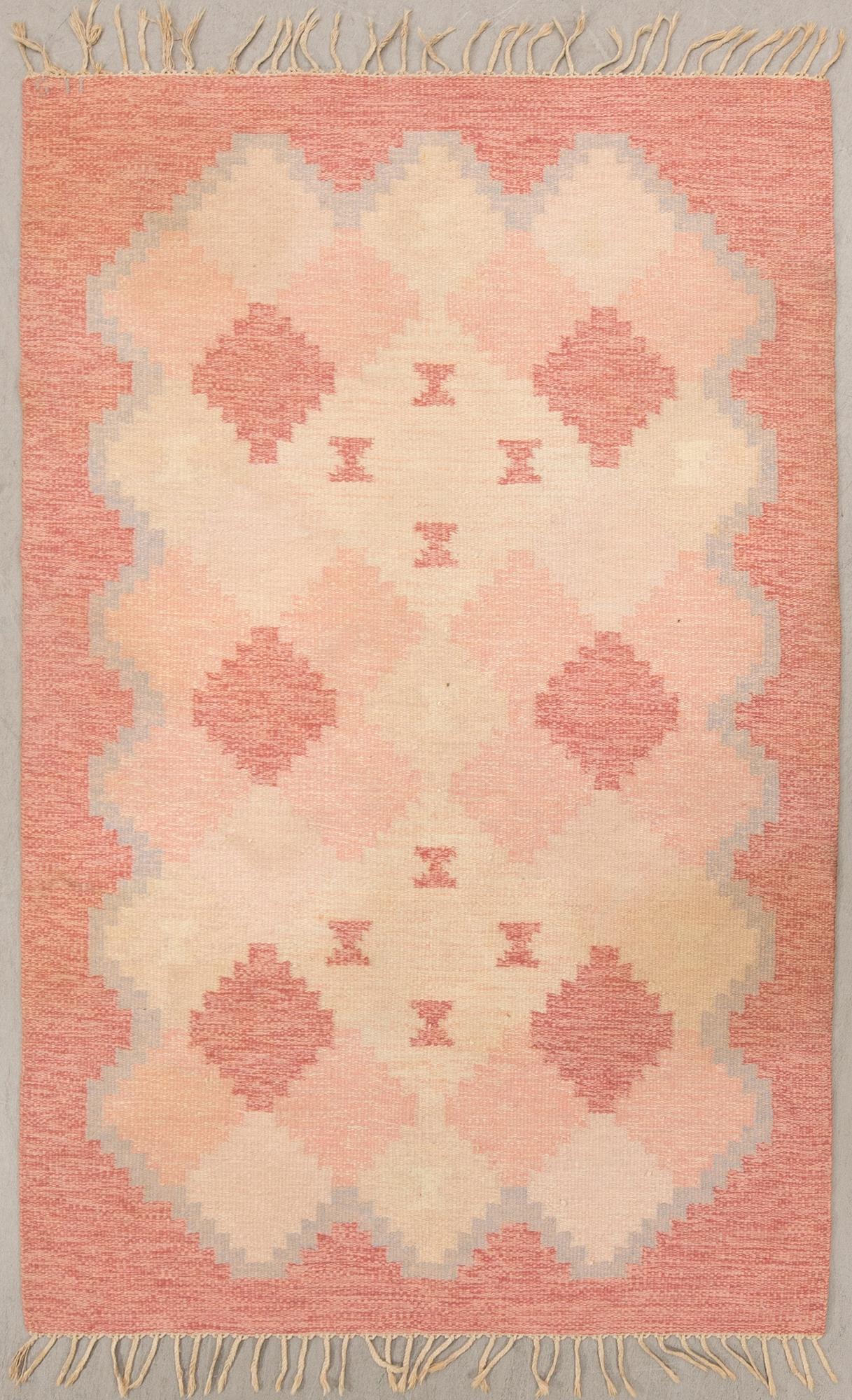 Matta rölakan signerad ILS ca 204x135 cm.