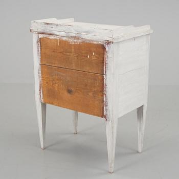 An early 19th century bedside table.