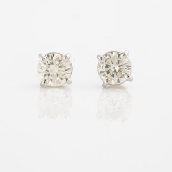 A circa 1.00 cts brilliant-cut earrings.