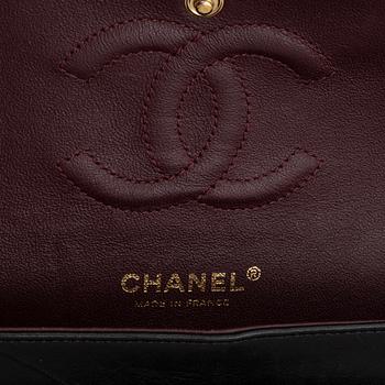 Chanel, a black, quilted leather 'Double Flap' bag, 2011.