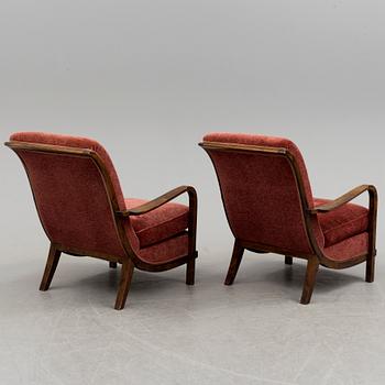 WILHELM KNOLL, a pair of stained birch easy chairs, 1930's/40's.